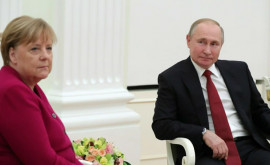 Биограф Путина объяснил напряженные отношения президента с Меркель