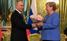 Новому канцлеру Германии предсказали сложности в отношениях с Путиным