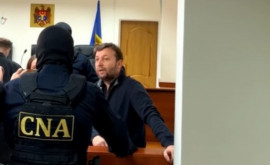Artur Reșetnicov a fost escortat în izolatorul CNA