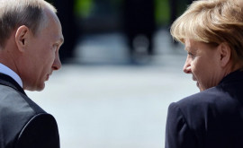 Merkel a cerut ca declarațiile lui Putin să fie luate în serios