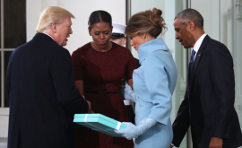 De ce sa strîmbat Michelle Obama cînd a primit cadoul de la Melania Trump