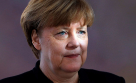 Merkel îi cere lui Erdogan eliberarea unui ziarist
