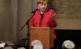 Merkel îl felicită pe Macron pentru marele succes înregistrat la alegeri