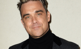 Robbie Williams diagnosticat cu tulburări cerebrale dă cărțile pe față
