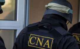 НЦБК задержал в Кишиневе полицейского за вымогательство