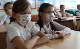 Почему дети в школе должны сидеть в масках после того как
