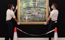 Lucrarea lui Banksy a fost vîndută la Sothebys în 8 minute