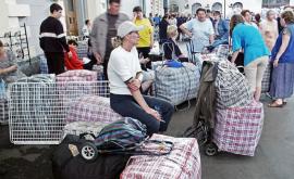 Клетчатая сумка символ миграции не только в Молдове