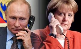 Putin și Merkel au discutat despre situația din Donbass