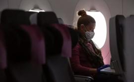 Spaţiul liber între pasagerii din avion reduce riscul de infectare