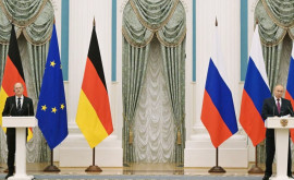 Cancelarul german va avea luni o discuţie cu Vladimir Putin