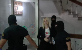 Marina Tauber escortată de mascați la Judecătoria Chișinău