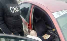 Flagrant CNA și procurorii anticorupție au reținut un polițist