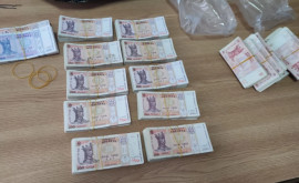 Percheziții la activiștii Partidului Șor soldate cu rețineri și sume mari de bani confiscate