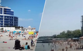 În Odessa oamenii se odihnesc în masă pe plaje și se scaldă în mare