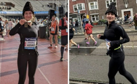 O moldoveancă a alergat la un maraton din Amsterdam purtînd o cușmă de cîrlan