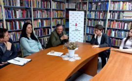 Întîlnire cu scriitorul Nicolae Rusu în incinta unei biblioteci din capitală 