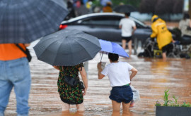 Проливные дожди сеют хаос в Китае 