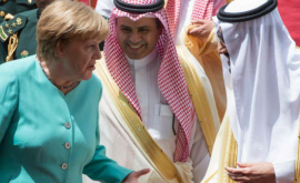 Merkel a refuzat să poarte văl la întîlnirea cu regele Arabiei Saudite