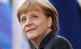 Меркель отступает не желая конфронтации с Шульцом