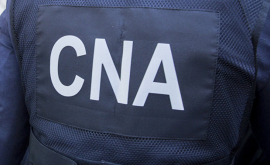 CNA a reținut trei persoane întrun dosar de corupţie