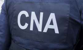 Doi ofițeri de investigație au fost escortați la CNA