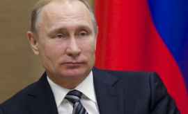 Putin şia anunţat oficial candidatura la alegerile prezidenţiale din Rusia