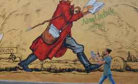 Un moldovean a realizat cea mai mare pictură murală istorică din Polonia FOTO