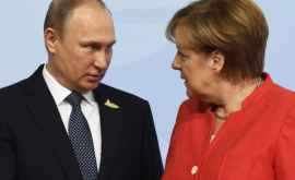 Меркель приехала к Путину и перешла на русский