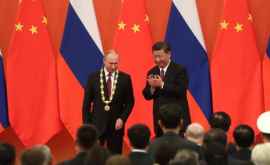 Putin a primit la Beijing prima Medalie a prieteniei