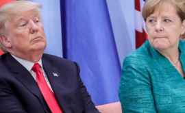 Merkel îi dă o replică acidă lui Trump dar nui menţionează numele