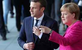 Меркель и Макрона заметили в баре Брюсселя ВИДЕО