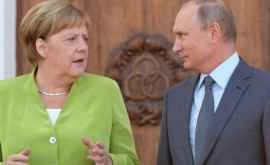 Putin se va întîlni cu Trump după ce va mînca cu Merkel