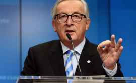 Brexit Juncker îi aruncă un colac de salvare Theresei May