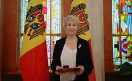 Conducătoarea comunității moldovenilor din Parma decorată de președinte