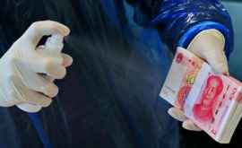 OMS recomandă spălarea mîinilor și evitarea atingerii feței la folosirea banilor