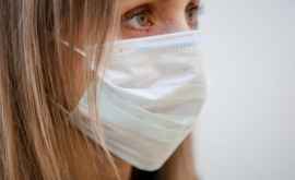 Cît timp rezistă coronavirusul pe o mască pentru față