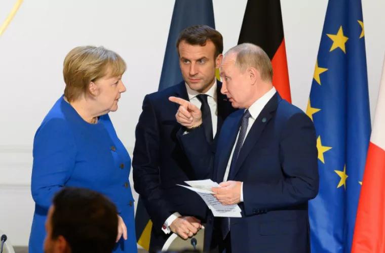 Merkel și Macron, discuții cu Putin despre cooperare în materie de vaccinuri anti-Covid