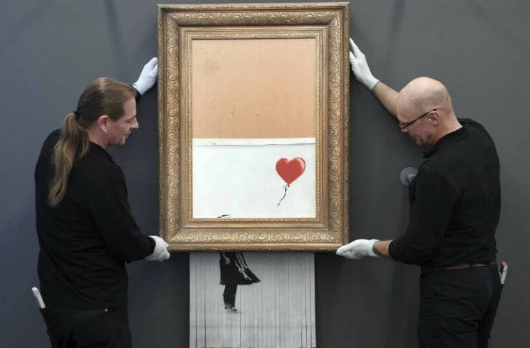 Un tablou parțial distrus al lui Banksy a fost vîndut la un preț record