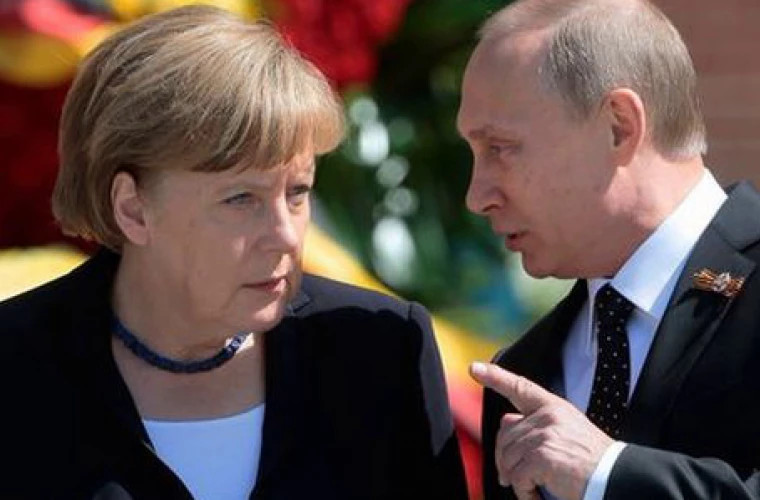 Меркель в разговоре с Путиным обвинила Минск в причастности к миграционному кризису