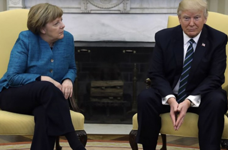 Merkel îi va cere lui Trump să nu forțeze Germania 