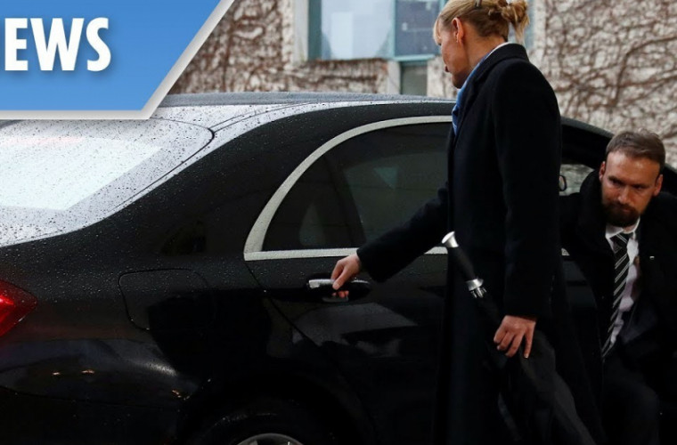 May s-a blocat în mașină înainte de întîlnirea cu Merkel (VIDEO)